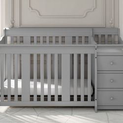 4-1 convertible crib With Changing Table Like new 