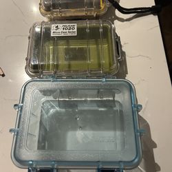 Two clear Pelican boxes and one non Pelican