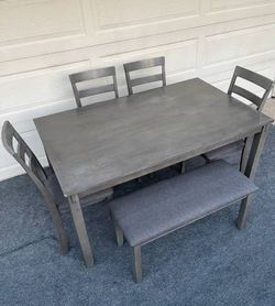 6-PC GRAY FINISHED DINING SET (TABLE, 1 PADDED BENCH AND 4 PADDED CHAIRS