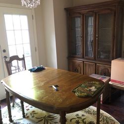 Dining table, 6 chairs, extra leaf for table, china cabinet.