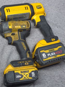 Dewalt batteries  light and very old but functional impact drill