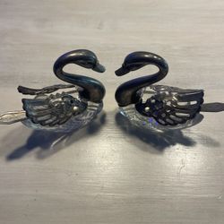antique silver-plated and crystal swan salt cellars.
