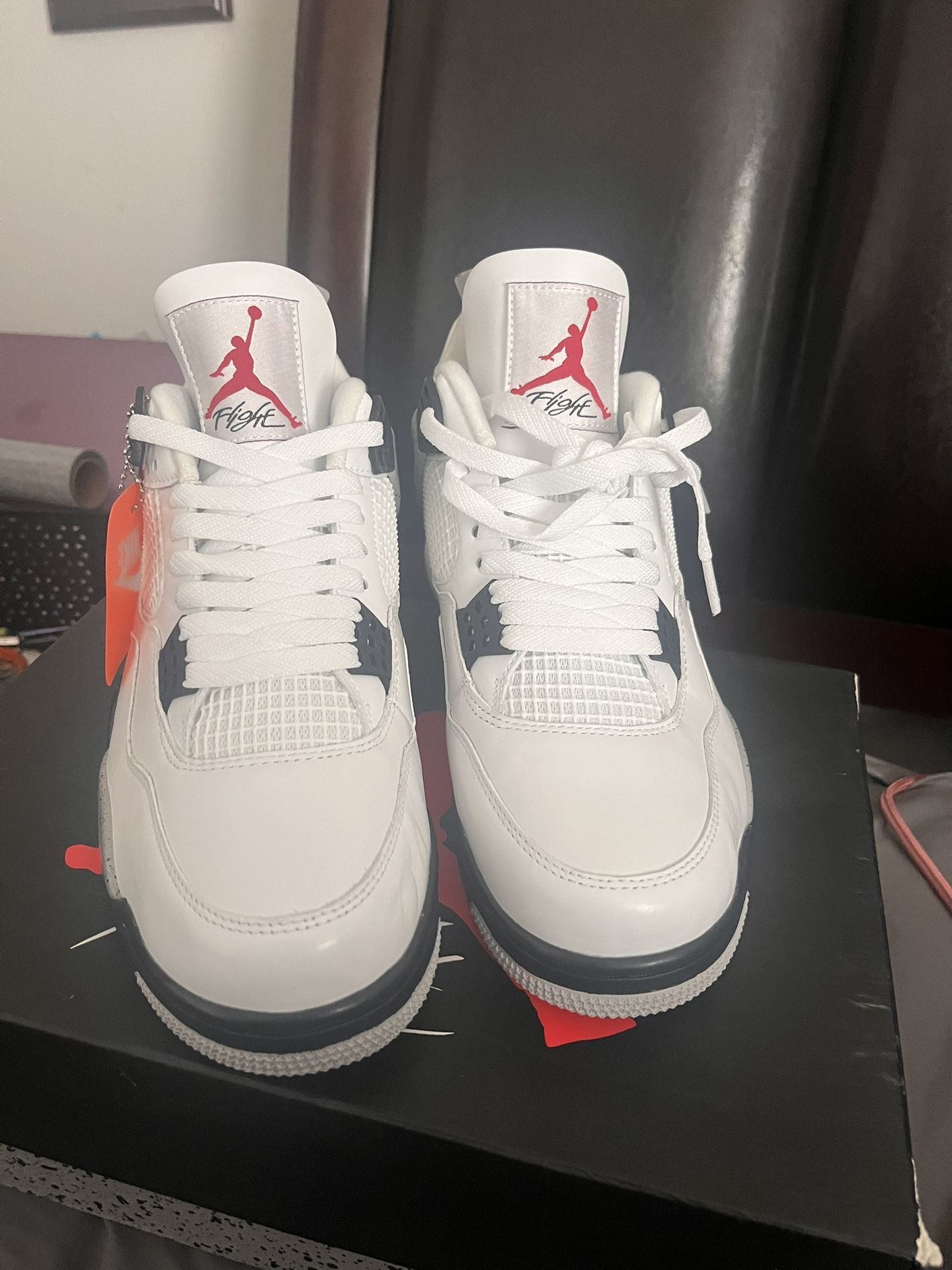 Jordan White Cement 4’s With Nike Sign On The Back