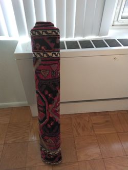 It looks like and Indian area rug runner, wide