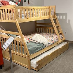 Bartly Natural Pine Twin/Full Bunk Bed With Twin Trundle
Homelegance$10 Down Payment And Financing Available