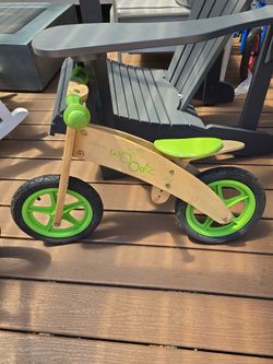 Wooden balance bike for toddlers
