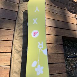 Kids Roxy Snowboard With Burton Bindings. 