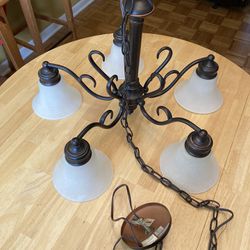 Chandelier with 48 Inch Long Chain/ Good condition/ See all pictures posted/ Pickup in Lake Zurich 