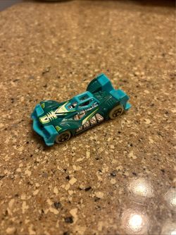 Hot Wheels Voltage Spike 1:64 Scale Diecast Toy  Car Turquoise white Wheels