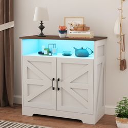 White wooden storage cabinet with built-in light and charging port station