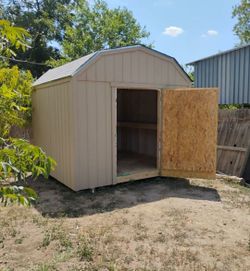 10x10 barn loft style shed with 2 interior wood shelves + 5 year warranty