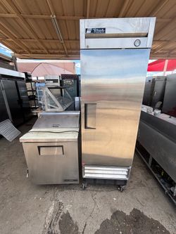 True refrigerator and prep table in excellent condition—very clean and ready to work.