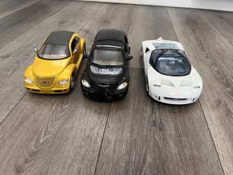 Diecast 1/18 scale lot of 3 cars 25 dollars for all 3