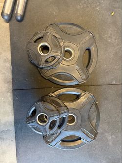 xmark weights 45s 5s and 2 1/2s Olympic