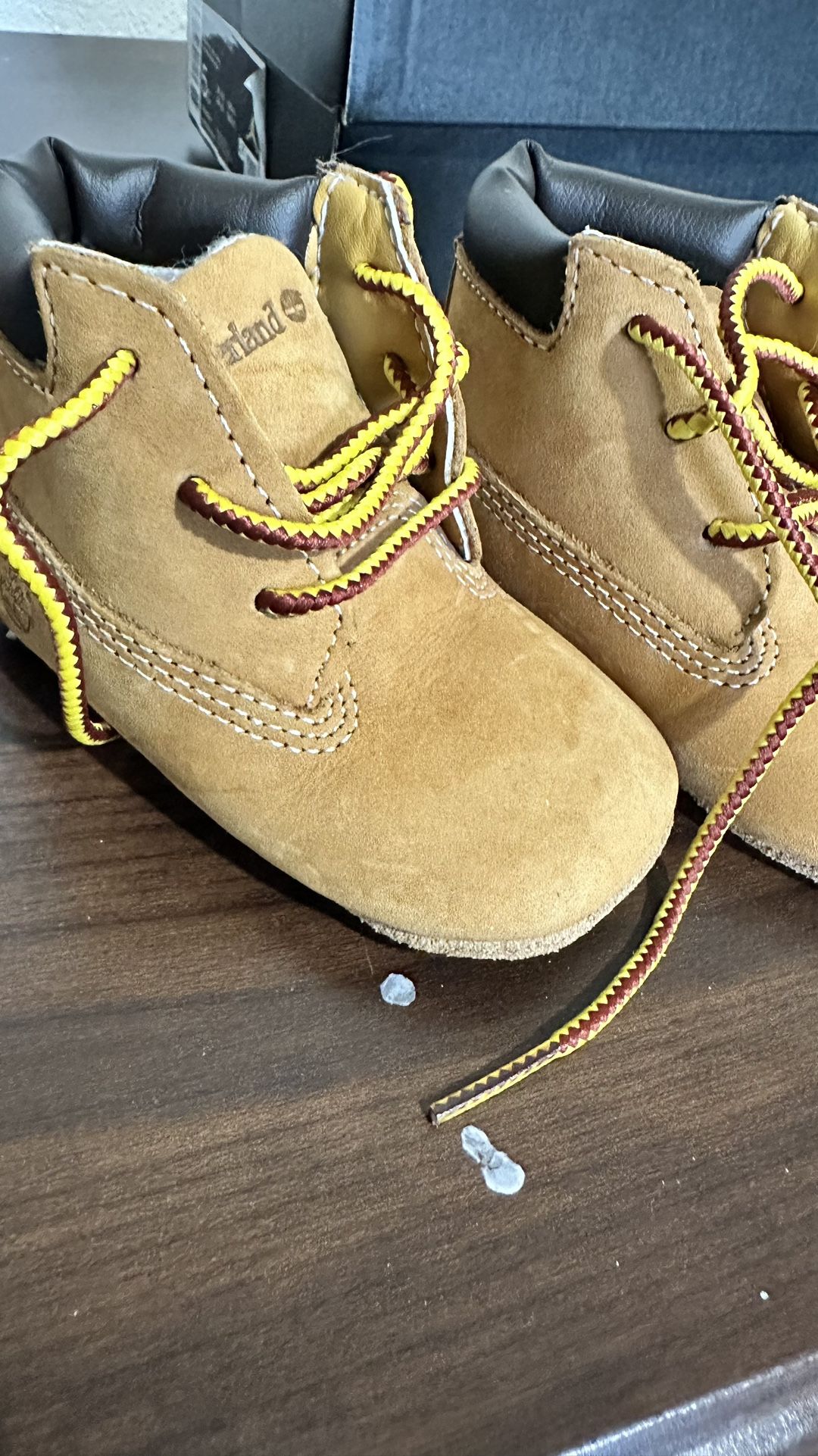 I am selling these timberland brand baby shoes, they are new.