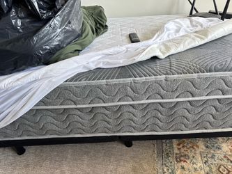 Adjustable XLTwin bed with heated mattress pad and 3 sets of sheets and a comforter