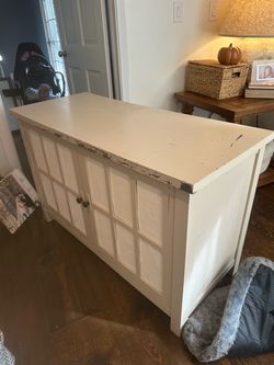 Cream Storage Cabinet with Textured Door Panels