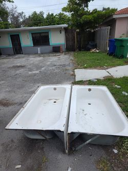 2 Free bath tub. No leak . Just need some paint.