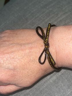 Kate Spade Black & Gold Glitter Bow Bangle Bracelet
