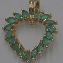 14kt yellow gold heart pendant w 17 marquise emeralds 0.10pts 2.7 grams mint. 878670-2.