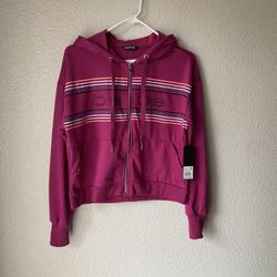 Brand new woman’s Bebe brand pink colored hoodie up for sale 