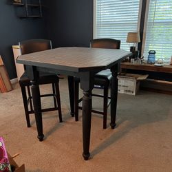 Tile Top Pub Table And Two Black Stools 