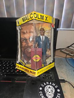 Olmec Toys Malcolm X Limited Edition Action Figure Black Leader Series No. 2. Sun damaged box.