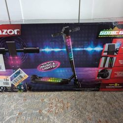 NEW In box/ Unopened Electric Razor Scooter With Built-in Bluetooth 
