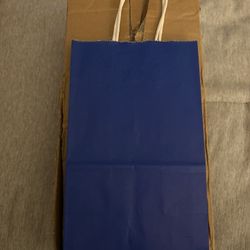 Box of Kraft bags with 48 pieces. Brand new. Color Blue 