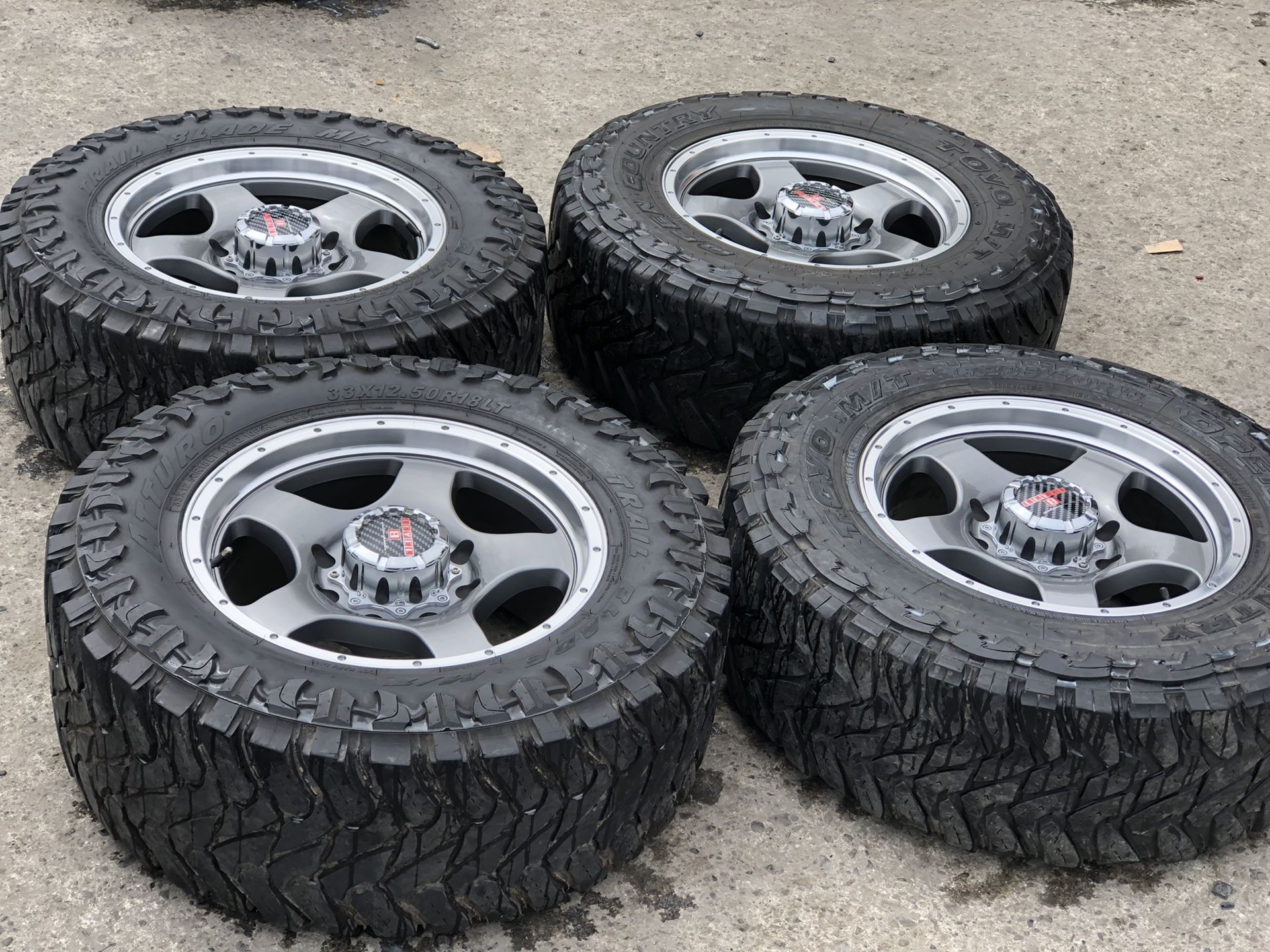18” new 8x180 rims with used mud tires for sale gmc Chevy for Sale in