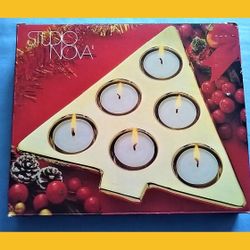 

Studio nova Christmas tree gold 6 tea light candle holder.

