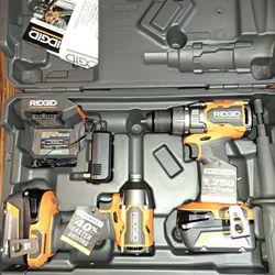 RIGID 1/2 HAMMER DRILL DRIVER / 1/4" IMPACT DRIVER  WITH 1 4AH 1 6AH BATTERY WITH CHARGER.