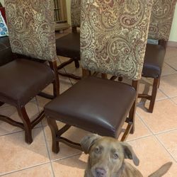 Four Paisley, Cherry Wood, And Faux Leather Chairs