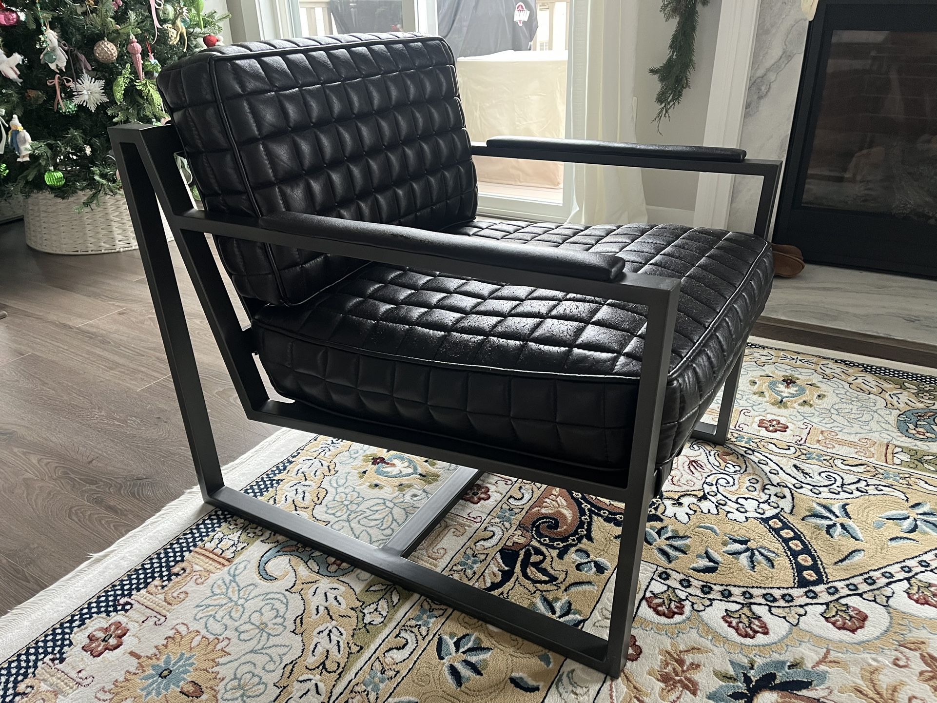 One black/gray metal and leather accent chair, removable cushions and covers
