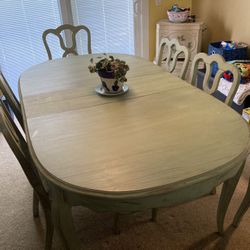 Table, Chairs, and Cabinet 