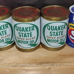 4 Full Oil Cans. Good Condition