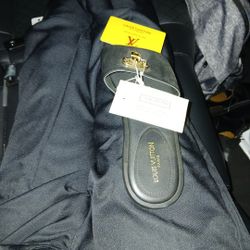 Louis  Vuitton Size 7 Woman's Sandal With Lock On Front Just The Left Sandal