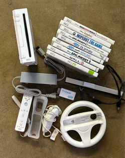 Nintendo Wii Console Bundle with cords, controller, and 9 games