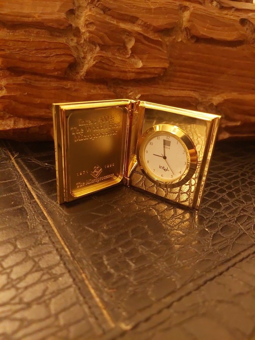 INTEL 4004 : WORLD'S
FIRST MICROPROCESSOR
25 YEAR ANNIVERSARY 1(contact info removed) GOLD CLOCK