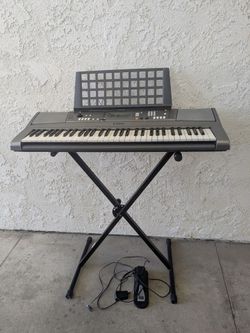 Yamaha Electric Keyboard with Stand and Pedal