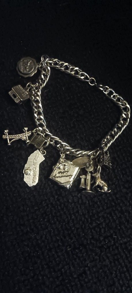 Must Pick Up Charm bracelet With Charms 