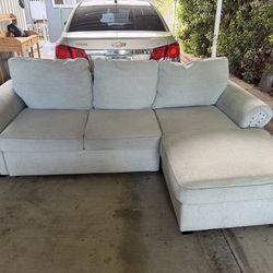 Pop up sleeper sectional sofa with storage