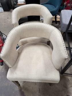 Two matching decorative chairs