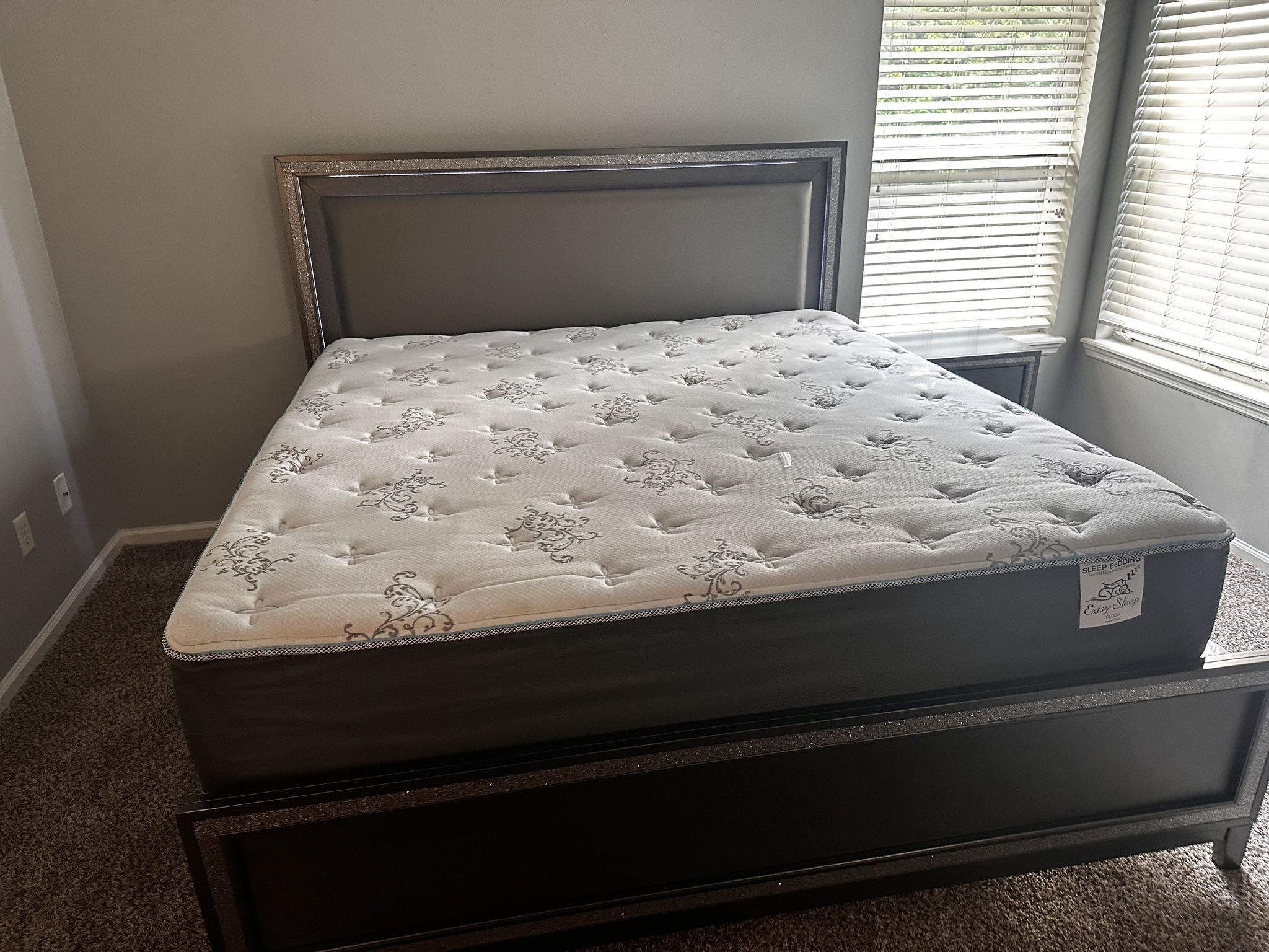 Bedroom; King LED bed and side table.