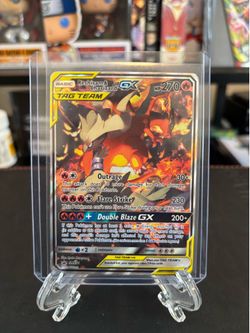 Pokémon Reshiram & Charizard GX SM201 Tag Team Promo Card (moderately played)