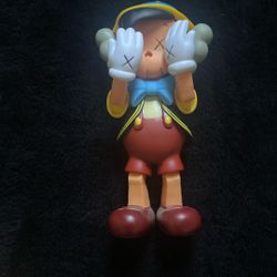 Kaws doll Pinocchio