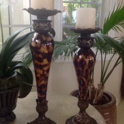 Pair of art glass and resin candle holders. Two bronze black gold elegant pillar candleholders