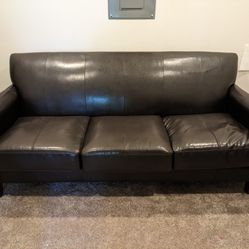 Three seater leather couch
