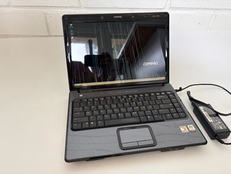 Compaq Presario V3000  AMD Turion 64 X2 1.6GHz 1GB RAM Win XP 14.1" Laptot