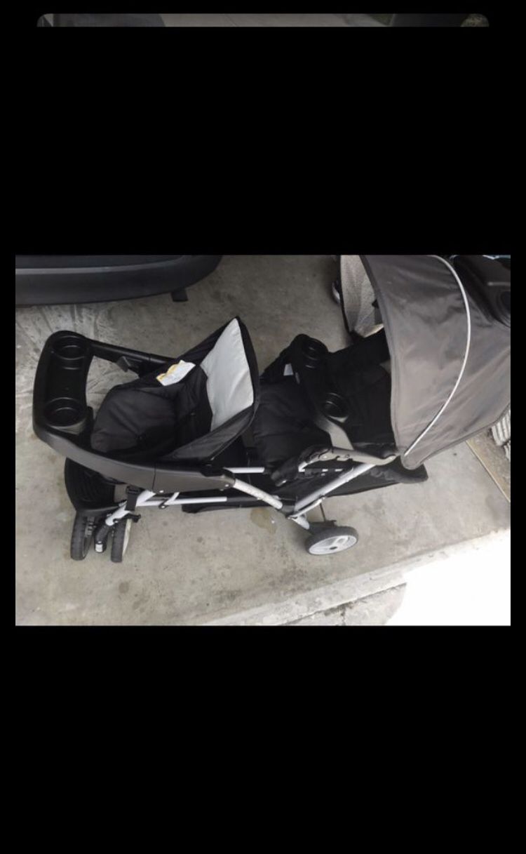 Double stroller with car seat